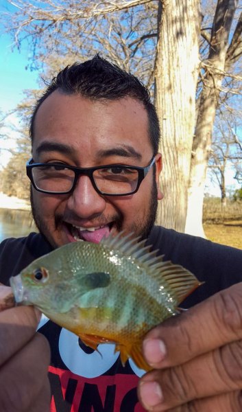Man with a small fish