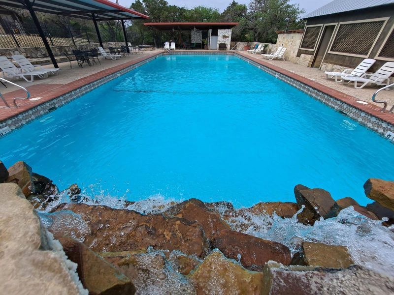 view of pool over the fountain
