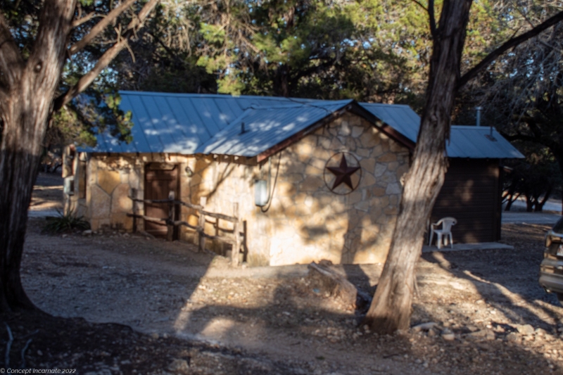 Outdoor view of cabins at sunset.