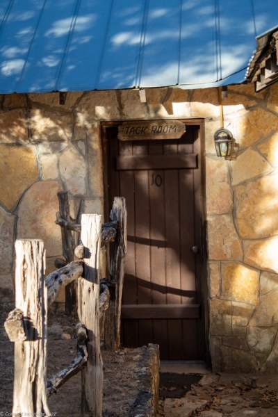 Outdoor view of cabin door at sunset.