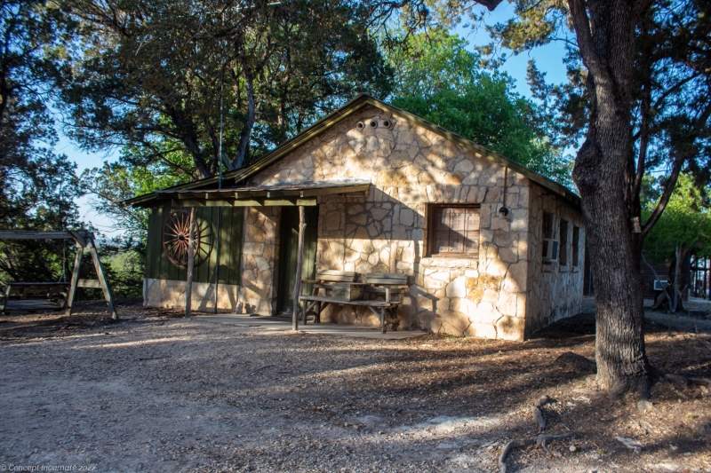 Outdoor view of cabins at sunset.