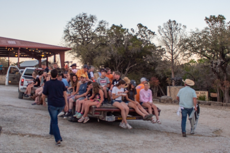 Guests loading up on a hay ride to the marshmellow roast.