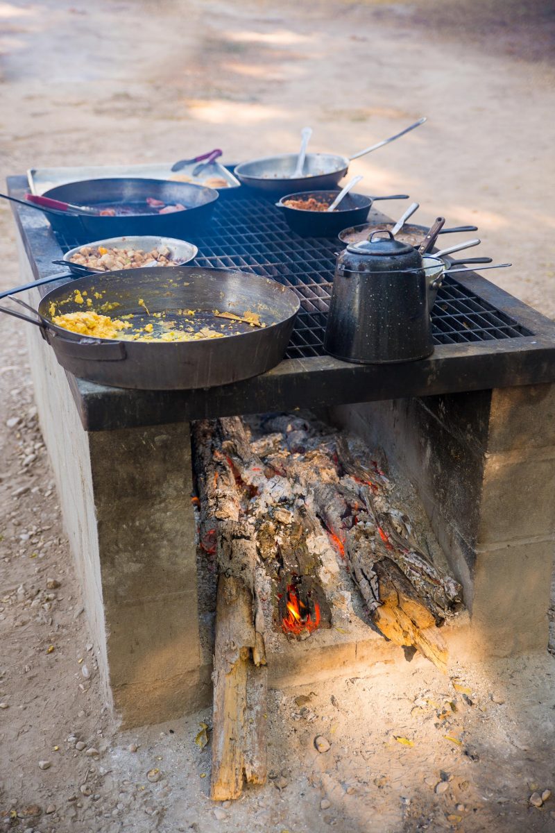 eggs and coffee cooking on a fire pit eggs and coffee cooking on a fire pit