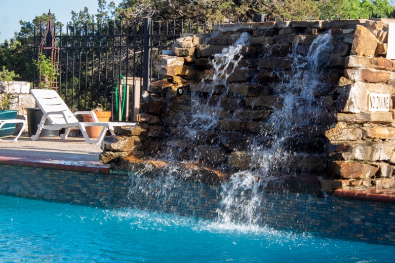 Pool fountain at sunset